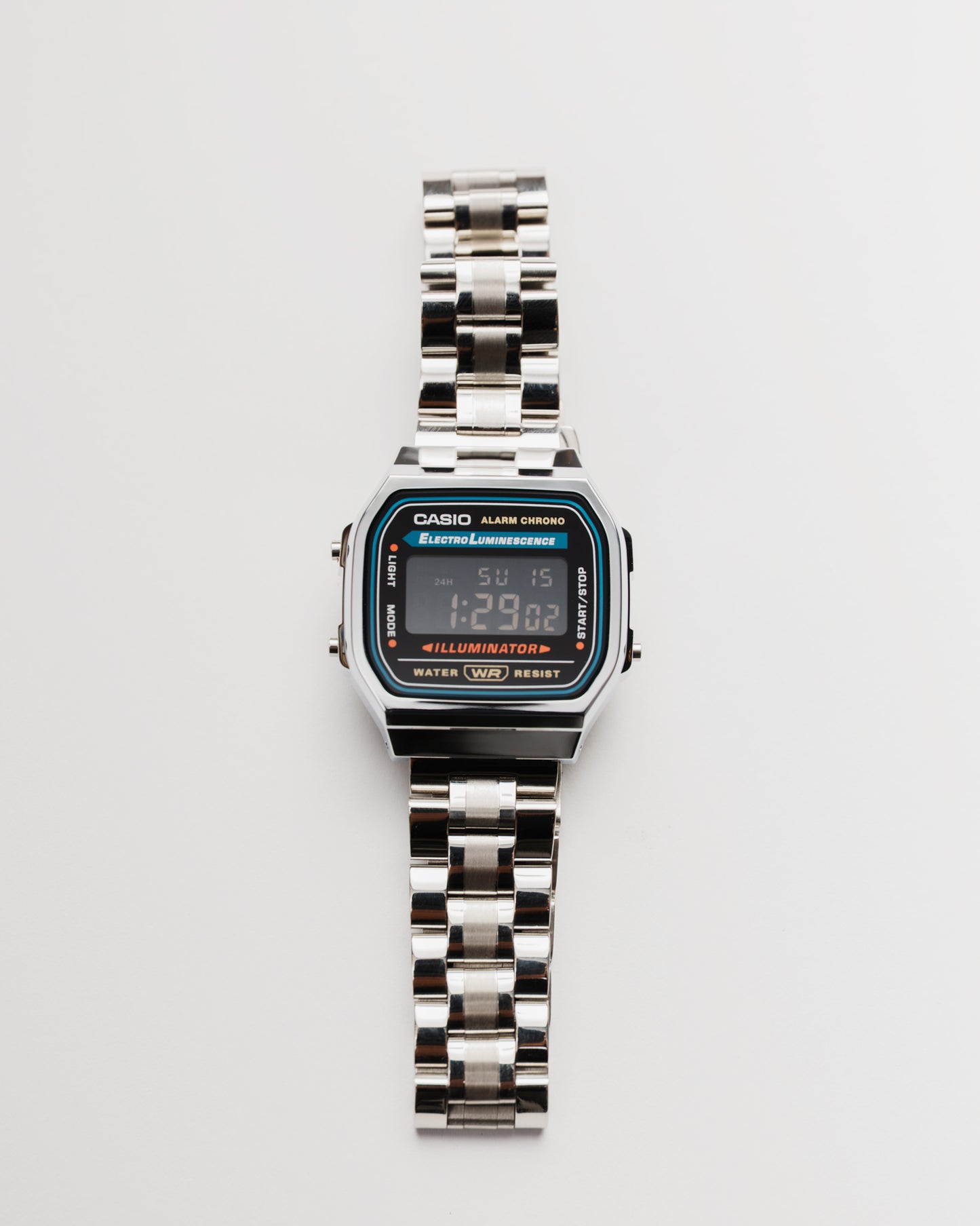 Digital watch with a metallic band modified Casio a168 - Casio mod with negative black screen