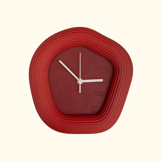Red Wallie wall clock with white hands on a white background by Ura Watches / Eon Time