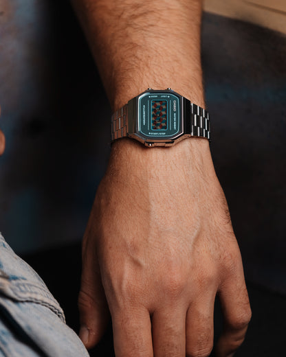 As you move the watch, the turquoise shifts with the light, turning almost fully silver and mirror-like at certain angles. We liked the idea of having something inside that would play a similar trick on your eyes. That’s how we ended up with these cubes. You can never quite tell which way each one is facing, and once you think you’ve figured it out, you see it differently again.