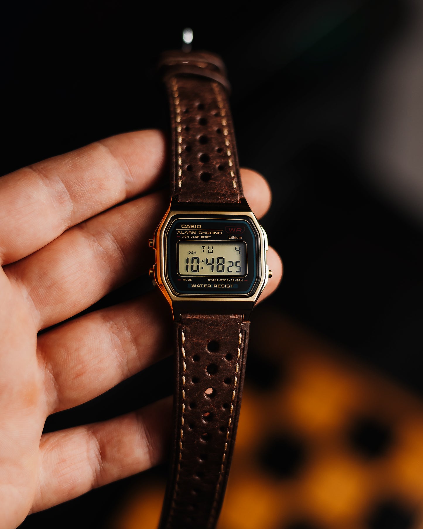 After receiving a lot of interest in our silver A158 mod called
"RoadRunner", " people kept asking for a gold bodied A158.
This is the answer to all of those questions.
Screen is gold tinted, and we made custom 22mm dark brown leather racing strap to fit lugs of this case.
It is very sleek and comfortable to wear due to its lightness and thin profile, a perfect companion for autumn and wintertime. Also, a nice info for all Casio lovers is the fact that the A158 &amp; A159 share the same mechanism as the pop