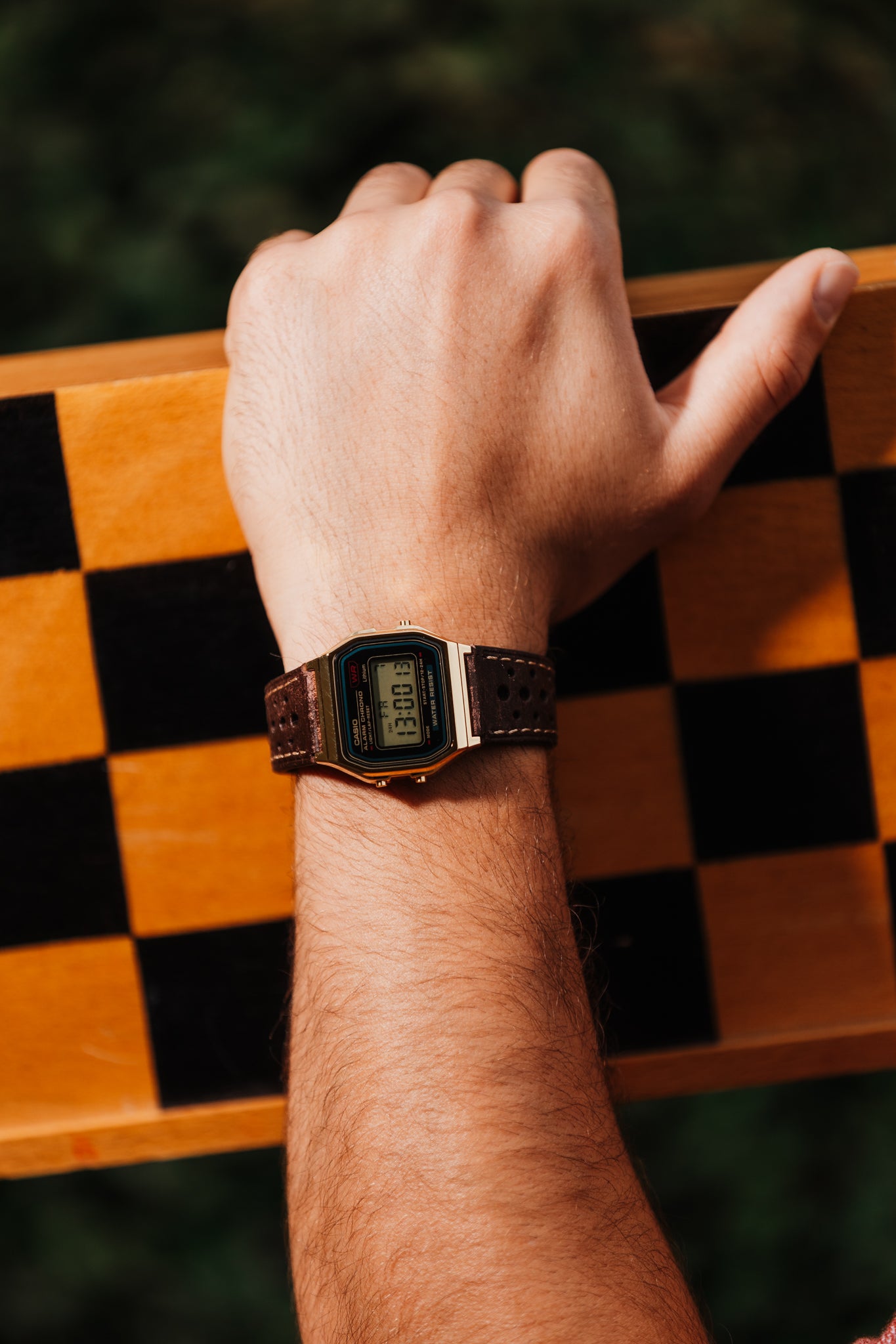 After receiving a lot of interest in our silver A158 mod called
"RoadRunner", " people kept asking for a gold bodied A158.
This is the answer to all of those questions.
Screen is gold tinted, and we made custom 22mm dark brown leather racing strap to fit lugs of this case.
It is very sleek and comfortable to wear due to its lightness and thin profile, a perfect companion for autumn and wintertime. Also, a nice info for all Casio lovers is the fact that the A158 &amp; A159 share the same mechanism as the pop
