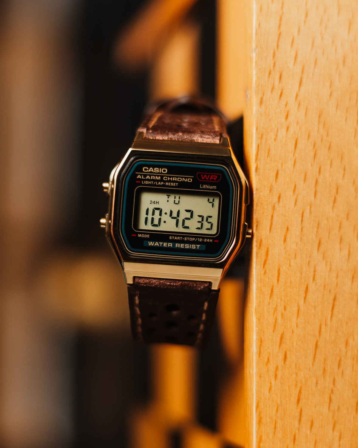 After receiving a lot of interest in our silver A158 mod called
"RoadRunner", " people kept asking for a gold bodied A158.
This is the answer to all of those questions.
Screen is gold tinted, and we made custom 22mm dark brown leather racing strap to fit lugs of this case.
It is very sleek and comfortable to wear due to its lightness and thin profile, a perfect companion for autumn and wintertime. Also, a nice info for all Casio lovers is the fact that the A158 &amp; A159 share the same mechanism as the pop