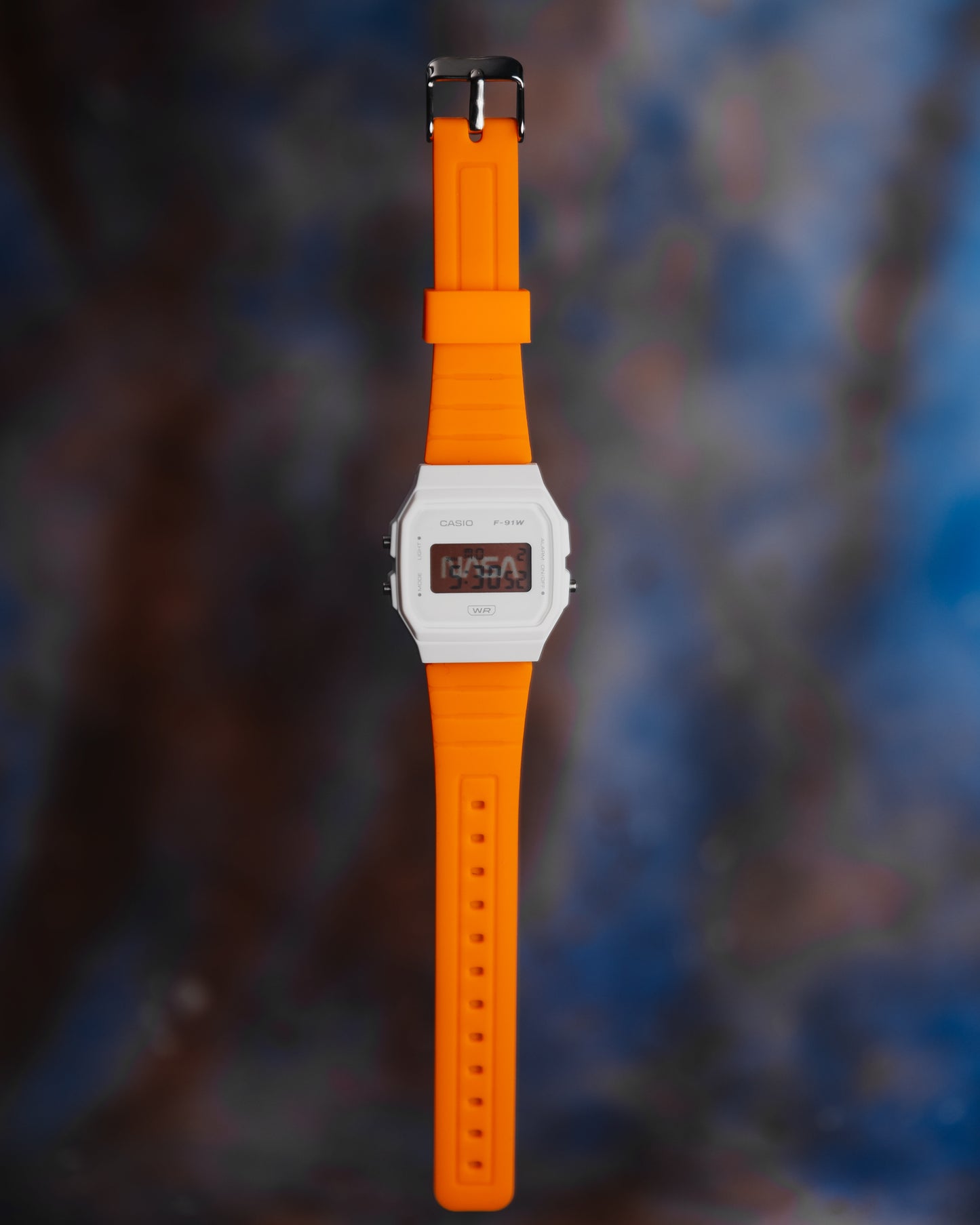 NASA F-91 modified Casio F-91W with white case, bright orange strap and custom display